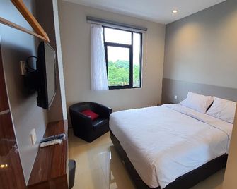 Yokotel Net - Bandung - Slaapkamer