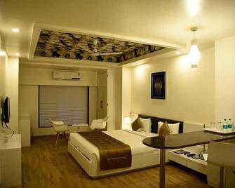 Hotel Pg Regency - Mahād - Bedroom