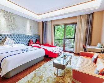 Tai 'an Moyu Porcelain Pleasant Art Hotel (Taishan Peach Blossom Valley Mountain Entrance Store) - Tai’an - Bedroom