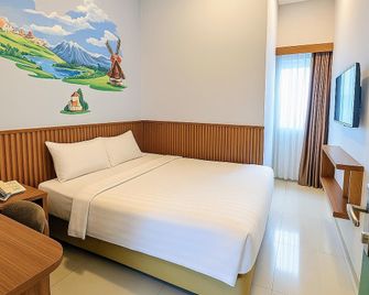 M Suite Homestay - Malang - Bedroom