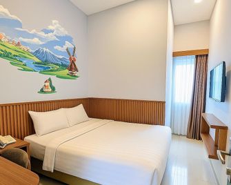 M Suite Homestay - Malang - Bedroom