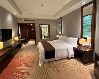 Baolong Hotel Shanghai - שנחאי - חדר שינה