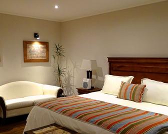 Primera Hacienda Hotel Boutique - לה סרנה - חדר שינה