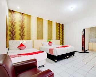 OYO 90114 New Cipayung Asri Hotel - Puncak - Bedroom