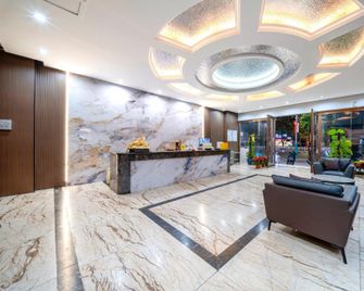 Yatong Business & Esports Hotel (Dongfang Municipal People's Government Branch) - Dongfang - Lobby
