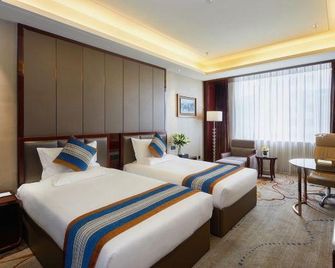 Zhenjun Hotel (Yinchuan Railway Station) - Yinchuan - Bedroom
