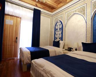 ショーニシンブティック - ブハラ - 寝室