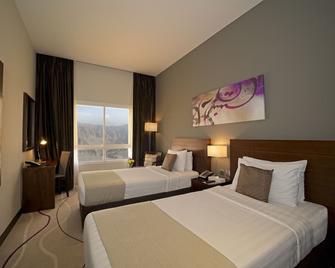 Action Hotel Ras Al Khaimah - Ras Al Khaimah - Bedroom