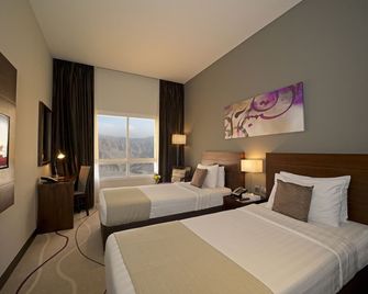 Action Hotel Ras Al Khaimah - Ra’s al-Chaima - Schlafzimmer