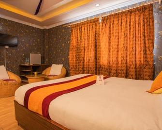 OYO 11457 Kathmandu Resort Hotel - Kathmandu - Bedroom