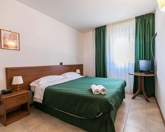 法基歐羅索飯店 - 佩斯卡塞羅利 - 臥室