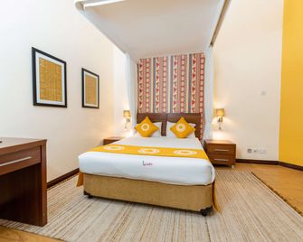 Heri Heights Hotel Apartments, SureStay Collection by BW - נאירובי - חדר שינה