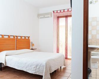 La Mezzanella Guesthouse - Porto Torres - Camera da letto