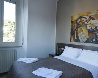 Ospitaci Appartamenti Viale Mezzetti - Foligno - Camera da letto