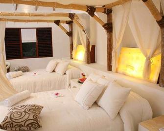 Hotel Okaan - Piste - Schlafzimmer