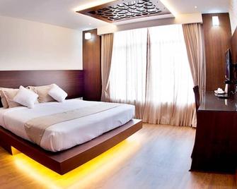Clyford Inn - Kannur - Slaapkamer