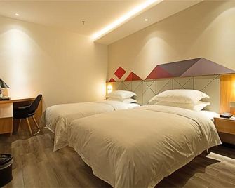 Borrman Hotel Jingzhou Jiangjin West Road Wanda Plaza Fantawild - Jingzhou - Schlafzimmer