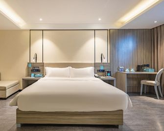 Xana Lite Hotel (Xichang Qionghai Wetland Park) - Liangshan - Schlafzimmer