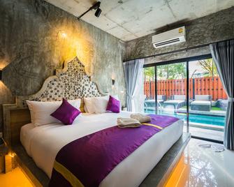 Maneetel Krabi Beachfront - Bãi biển Aonang - Phòng ngủ