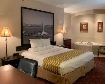 سوبر 8 باي ويندام ألباني - الباني (نيويورك) - غرفة نوم