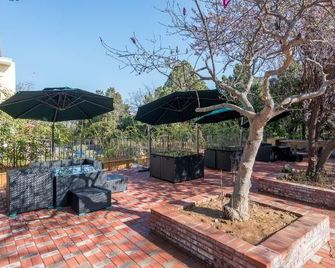 Jingli Villa Hotel (Qingdao Badaguan Scenic Area Linhuaiguan Road Branch) - Qingdao - Innenhof