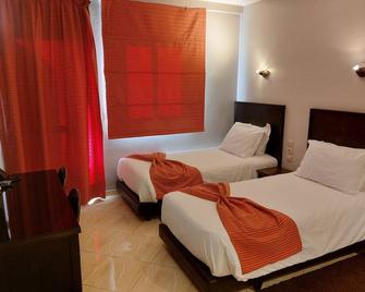Résidence Hotelière Fleurie - Agadir - Bedroom