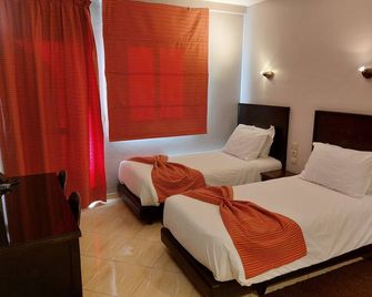 Résidence Hotelière Fleurie - אגאדיר - חדר שינה