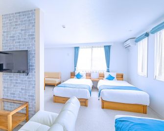 Hotel California Miyakojima Resort - Miyakojima - Ložnice