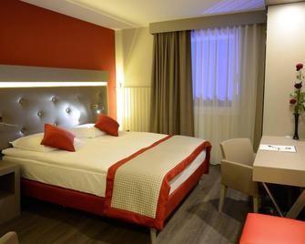 Everness Hotel & Resort - Chavannes-de-Bogis - Bedroom