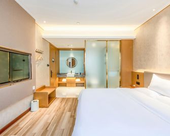 Starway Hotel Harbin Guogeli Street Qiulin - هاربين - غرفة نوم