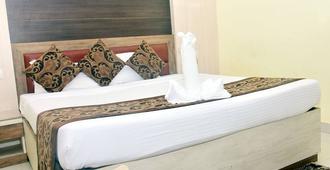 Hotel Arya Palace - Bhubaneswar - Bedroom