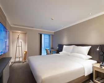 Hanting Hotel Chongqing University Town - تشونغتشينغ - غرفة نوم