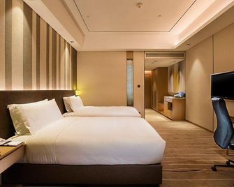 Yunding Hotel - Guang'an - Camera da letto