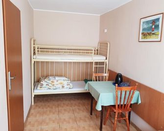 O.W. Krakus II - Domki i Pokoje - Stegna - Sypialnia