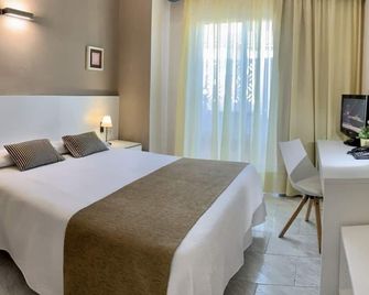 호텔 레스토랑 얀솔라 - 산 카를로스 데 라 라피타 - 침실