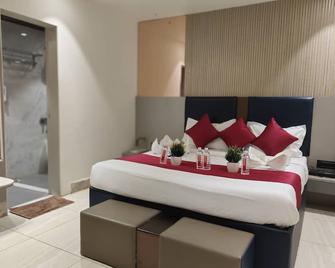 Hotel Shirdi Park Inn - Shirdi - Habitación