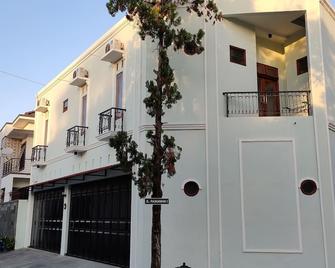 Zg Homestay Solo - Solo City - Bâtiment