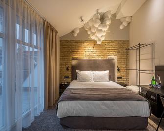 Artagonist Art Hotel - וילנה - חדר שינה