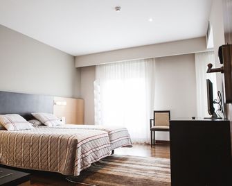 Hotel Ríos - San Adrián - Schlafzimmer