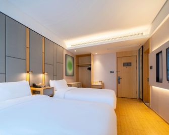 Ji Hotel(Rizhao Wanpingkou Scenic area Branch) - Rizhao - Bedroom