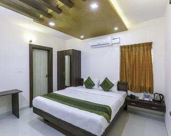 Treebo Trend Pratham Presidency - Bagaluru - Bedroom