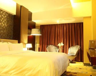Kelly Hotel (Qinzhou Nianfeng Square) - Qinzhou - Chambre