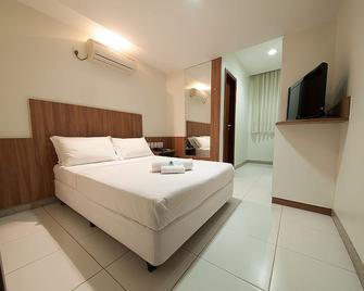 Premium Executive Hotel Itabira - Itabira - Camera da letto