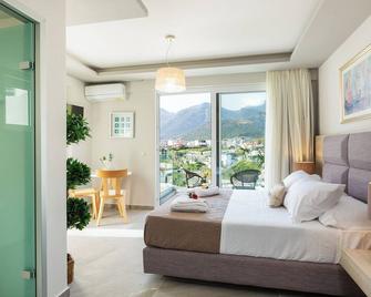 Akrogiali Apartments 'by Checkin' - Bali - Bedroom