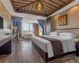 Sansejin Theme Hotel (Kaifeng Millennium City Park) - Kaifeng - Bedroom