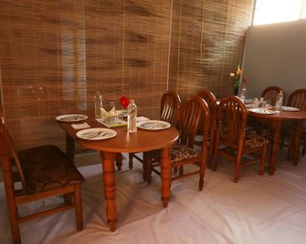 Ample Inn - Devanhalli - Comedor