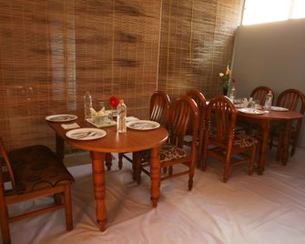 Ample Inn - Devanhalli - Dining room