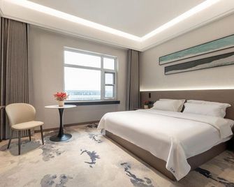 Star Patton Business Hotel - Tangshan - Habitación