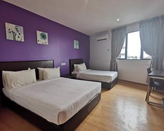 Padungan Hotel - קוצ'ינג - חדר שינה