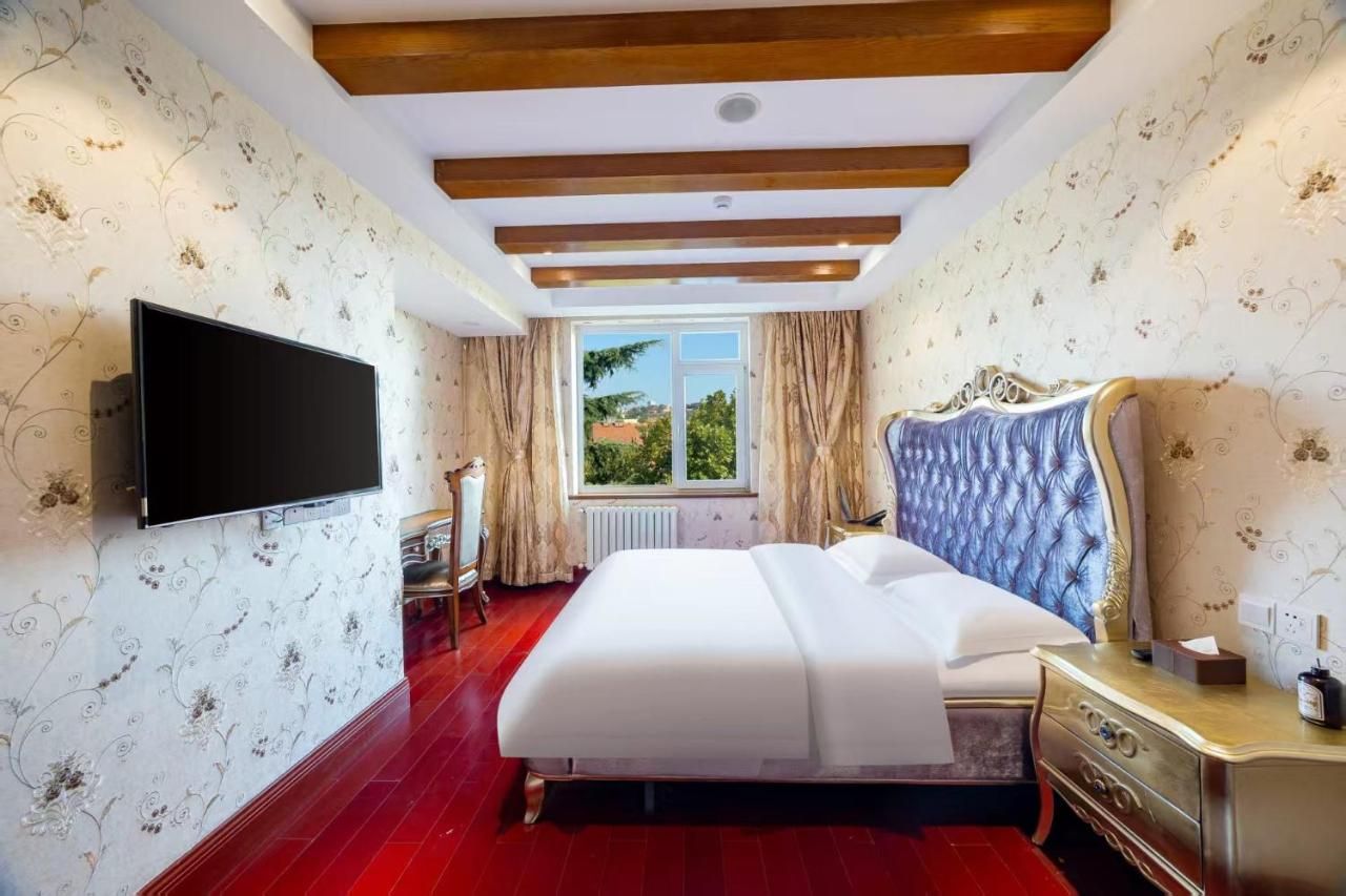 沃德酒店青岛栈桥信号山地铁站店